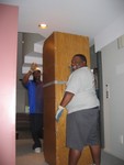 Toney and Nick ... two men and a half of a wall unit.